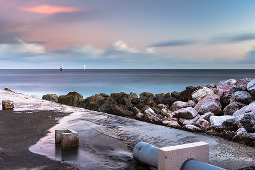 Tug Sailing into Port by CanonDLee, Delicate little squiggly line from a tugboat sailing past at sunset. Taken with a LEE Little Stopper