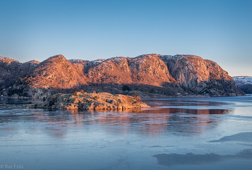 sunshine sunrise winter water cold pinklight ice fjord frozen farsund vestagder norway no