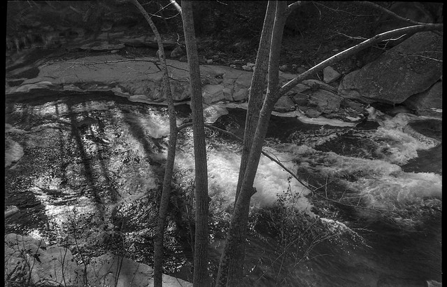 looking down, through the trees Broad River, long shadows, ice, Bat Cave, North Carolina, Olympus XA, Arista.Edu 200, Moersch Eco Film Developer, early January 2018