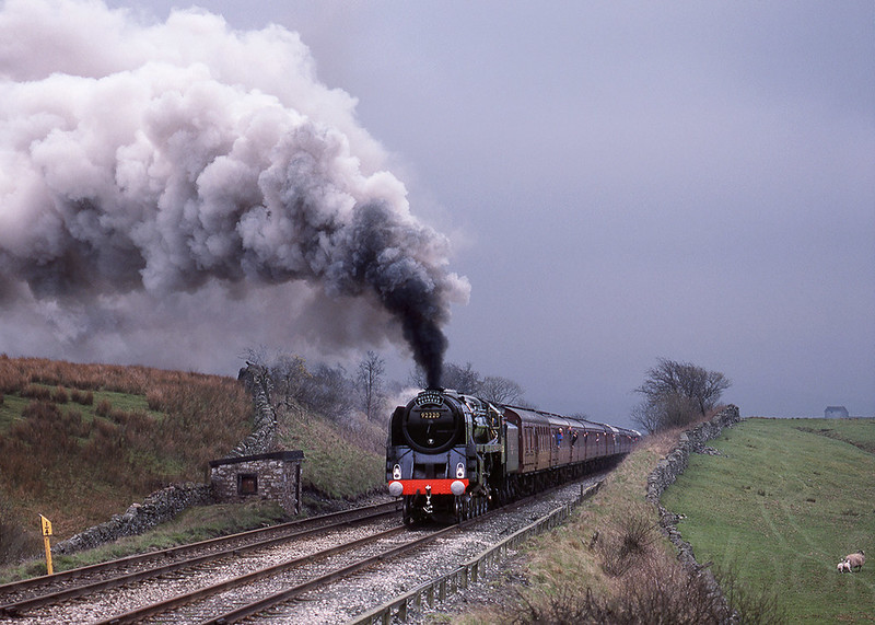 16th April 1988
British Railways 9F No. 92220 Evening Star in dull and windy conditions passing number 2 field at Horton in Ribblesdale