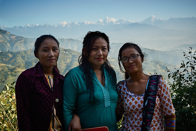 Newari girls in front of Himalaya Range, Dulikhel, Katmandu Valley, Nepal
