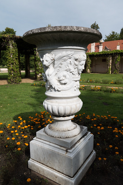 Outdoor planter with mythical figures