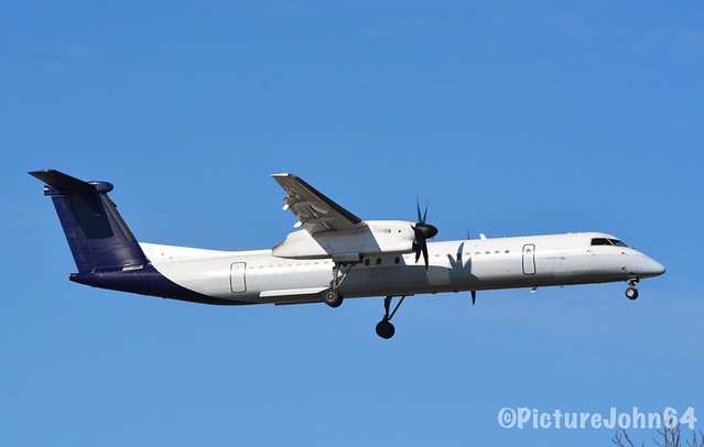 BE105 Dash8 (G-ECOI) with hybrid Brussels and Flybe scheme from Birmingham arriving at Schiphol Amsterdam