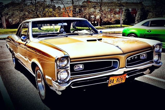 gold-tone Pontiac GTO | classic American muscle cars