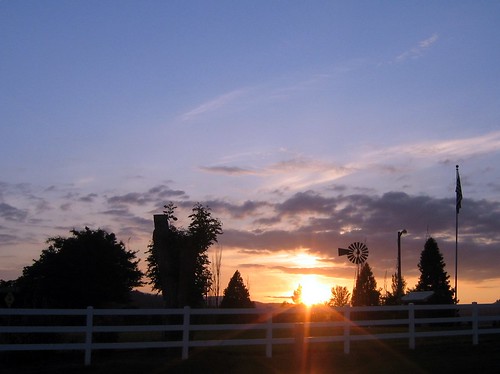 trees sunset windmill clouds oregon fence farm flag corvallis