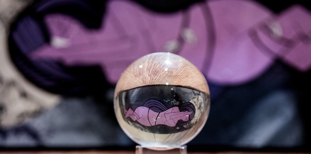 Coloquix purple lass asleep in a bubble