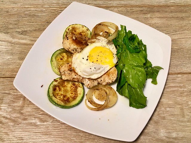 Chicken, arugula (so weird to say this!), zucchini, onions and egg