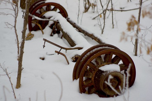 vintage nostalgia sonynex5n jupiter850mmf2 minnesota agriculture ice snow winter farm rust shelterbelt wheel antique
