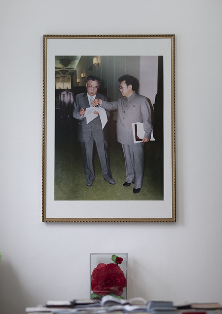 Official picture of Kim il Sung and Kim Jong il with a Kimjongilia flower below, Pyongan Province, Pyongyang, North Korea