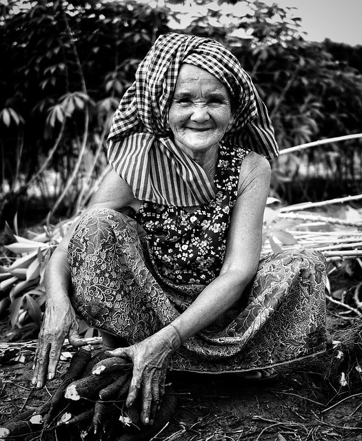 The hard working grandmother.... this was taken in rural Cambodia while she was helping to farm the fields ... a wise woman with a beautiful smile ❤️❤️