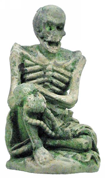 Ancient skeleton statue