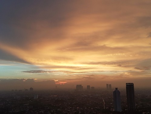sunset skyline dusk city sky jakarta kemang indonesia clouds