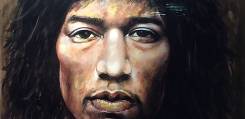Close-up long-haired musician portrait in earthy tones