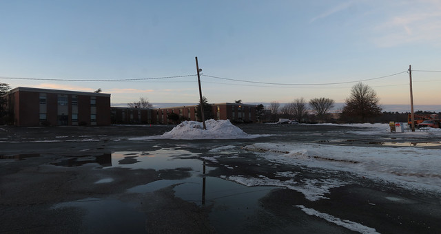 Lord Wakefield parking lot, snow bank and puddles; Wakefield, MA (2017)