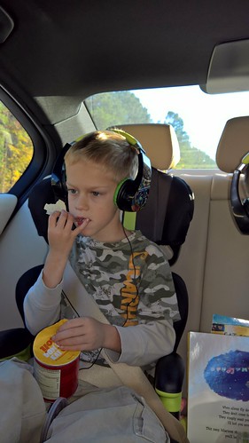 paxton hey carseat eating headphones