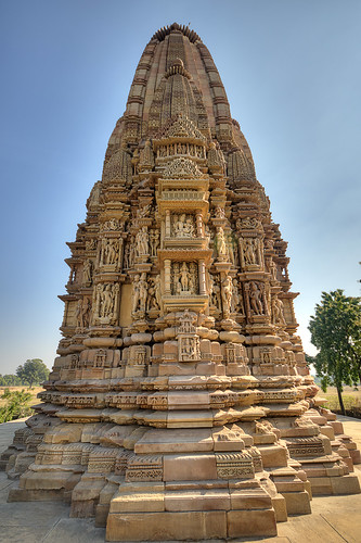 khajuraho orchha madhyapradesh india heritage unescoworldheritagesite temples architecture temple indian religion culture hinduism sculpture stone travel tourism ancient landmark unesco historic old monument history art erotic religious hindu world historical pradesh madhya place asia building statue famous kamasutra ornate carving tourist site sex antique background vishnu shiva attraction carved nude holy facade woman