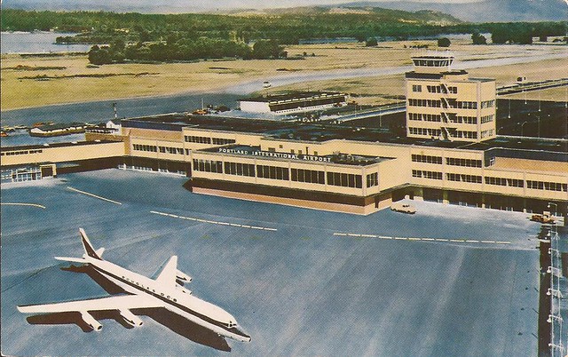 Portland International Airport (PDX) postcard - artist's rendering of new terminal (opened 1959) with a new DC-8 jet on the tarmac - circa late 1950's