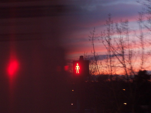 Paris sunset - with red man and brake light from bread van