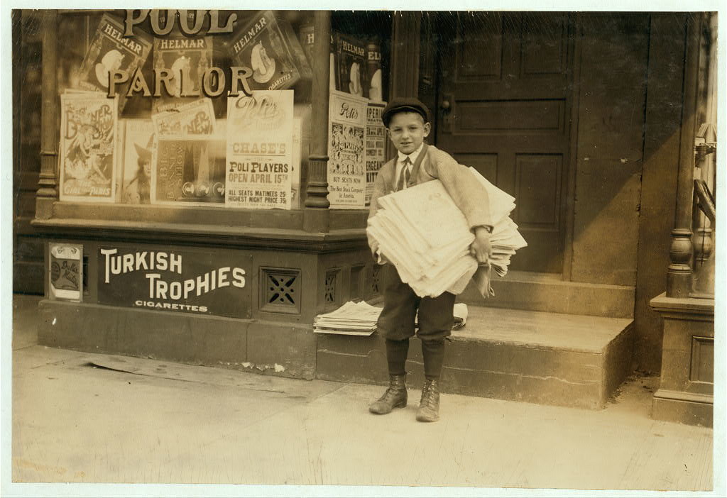 Hyman Lapcoff, 1526 Fourteenth St., N.W., Washington, D.C., a ten year old newsie from a good family, carrying a heavy load of newspapers quite a distance.  [Washington (D.C.), District of Columbia] (LOC)