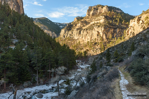 tonguerivercanyon bighornmountains bighornnationalforest dayton wyoming nikond750 tamron2470mmf28 tongueriver flowing water january winter ice icy snow sunlight blue sky trail path gold golden cliffs walls rocks boulders
