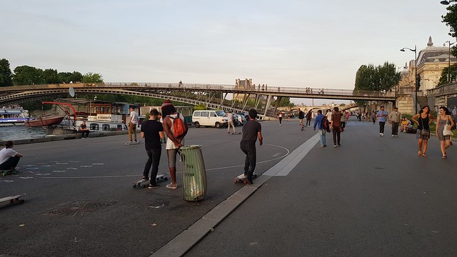 Skateboarding by the river Seine, Paris, July 2017