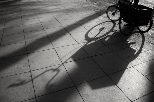 Tricycle and shadow