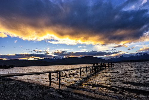 sunset pier beach lake teanau clouds orange blue water nz new zealand calm outdoor landscape landscapes nature sony a7m2 travel travelgram travelling picoftheday photooftheday bbctravel natgeo natgeotravel national geographic lonelyplanet lonely planet mountain mountains