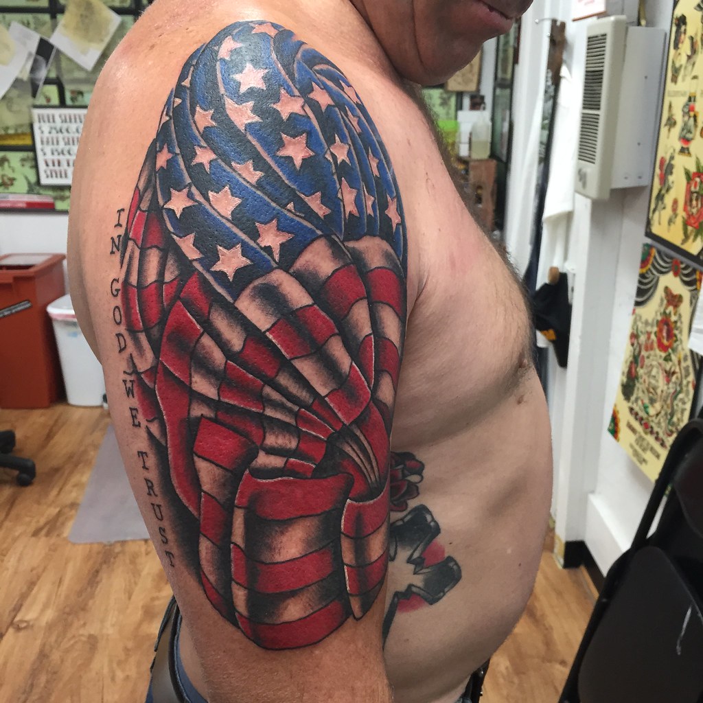 American Flag Realistic Tattoo Skin Tear by Kyle Grover TattooNOW