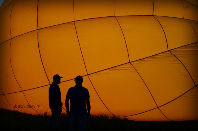*heavenly angels in a hot air balloon silhouette*