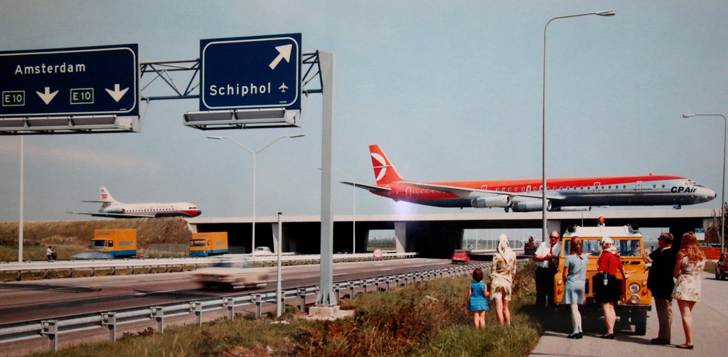 Amsterdam Schiphol in the 1970s publicity shot by the runway tunnels featuring CF-CPQ DC-8-55 of Canadian Pacific and Sud Aviation SE 210 Caravelle 10R CS-TCA of TAP Air Portugal