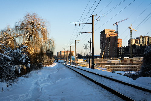 city buildings railway landscape snow road