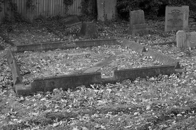 Fallen cross on a Blackwell grave