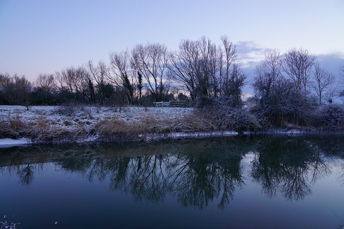 clevedon northsomerset england uk gb greatbritain outdoors sony a6000 ice snow winter evening blue purple kingdom reflection trees grass nature fence water river riverbank sky landscape