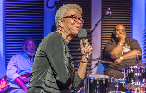 Germaine Bazzle at WWOZ. George French and Gerald French in the background. Photo by Marc PoKempner.