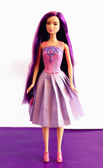 Fashion doll wearing Origami skirt