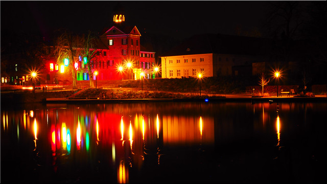 The bay of Eutin with the castle at night