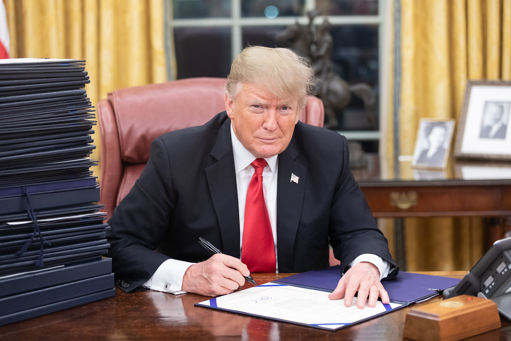 President Trump at his desk | President Donald J. Trump is s… | Flickr