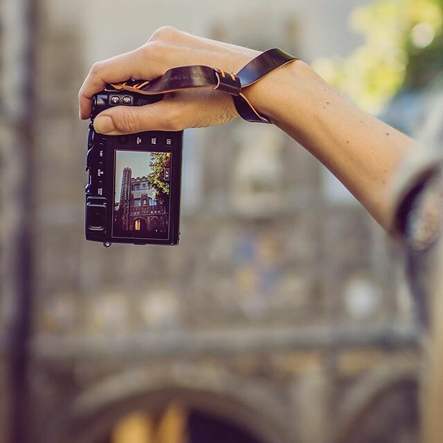 Higher education vibes at Trinity College, Cambridge. Shooting with the lovely Fuji X-E3 and using a special Horween Shell Cordovan wrist strap. We made a few of these beauties for us to use ourselves and are loving them! #shellcordovan