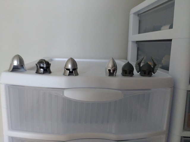 My Gondor helmets  3 on the right are from nicebrick   The 1 on the left i made out of those 2 Lego helmets next to it