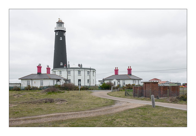 Dungeness Lighthouse and Keepers Cottages, Dungeness, Kent, England.