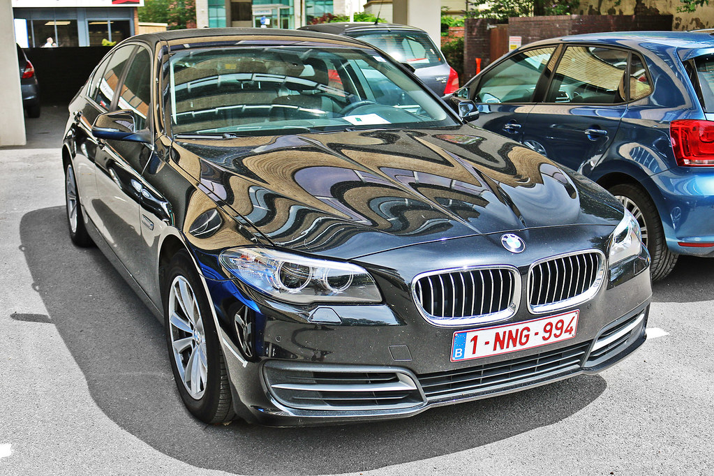 BMW 5series F10 1NNG994 Belgium Parked at a car