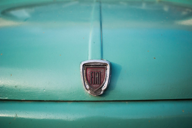 Vintage Fiat sign on an oldtimer car