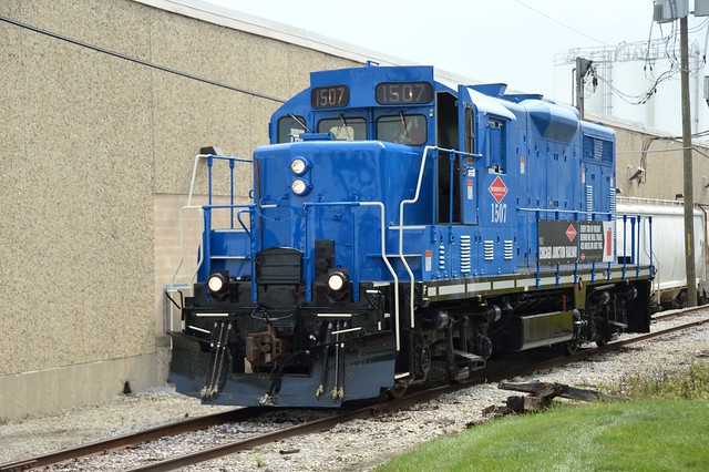The Chicago Junction 1507  rolls along one of the many narrow alleys of the Elk Grove Village Industrial Park.