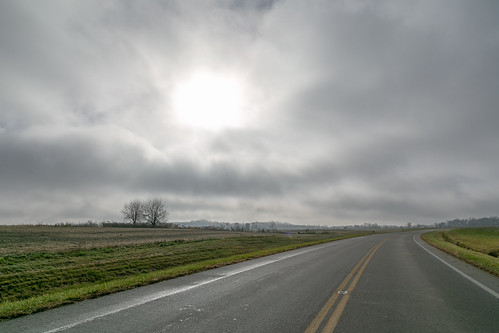 fog clouds parting winchester ohio unitedstates us road rural farmland scenic pleasant view overcast sun pavement trees field adamscounty olivertownship