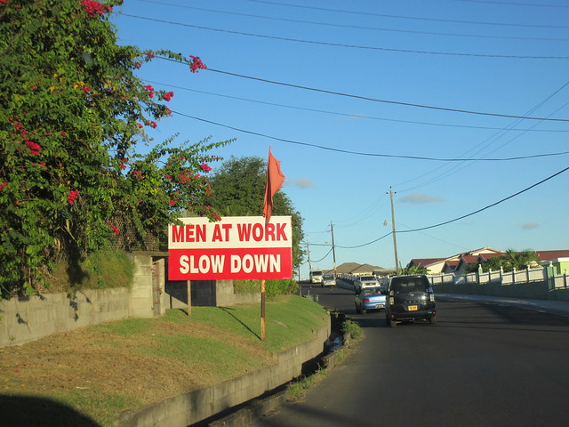 Men at Work Slow Down: sign on outskirts of Basseterre, St. Kitts