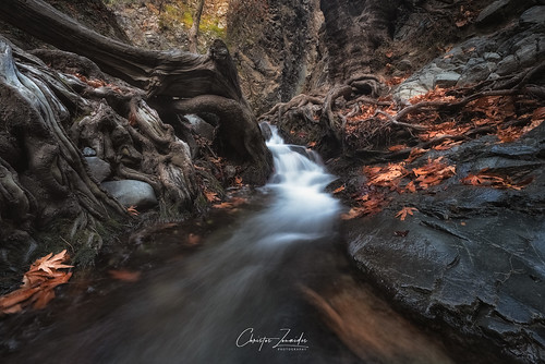 mountain idyllic valley scenic scenery cliff landscape millomeris waterfall troodos mountains cyprus autumn water river stream flow nature longexposure fall rocks blur lake pond roots wbpa orange leaves trees