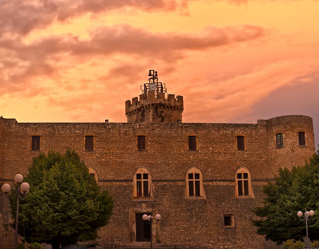 Piccolomini castle under an orange sky