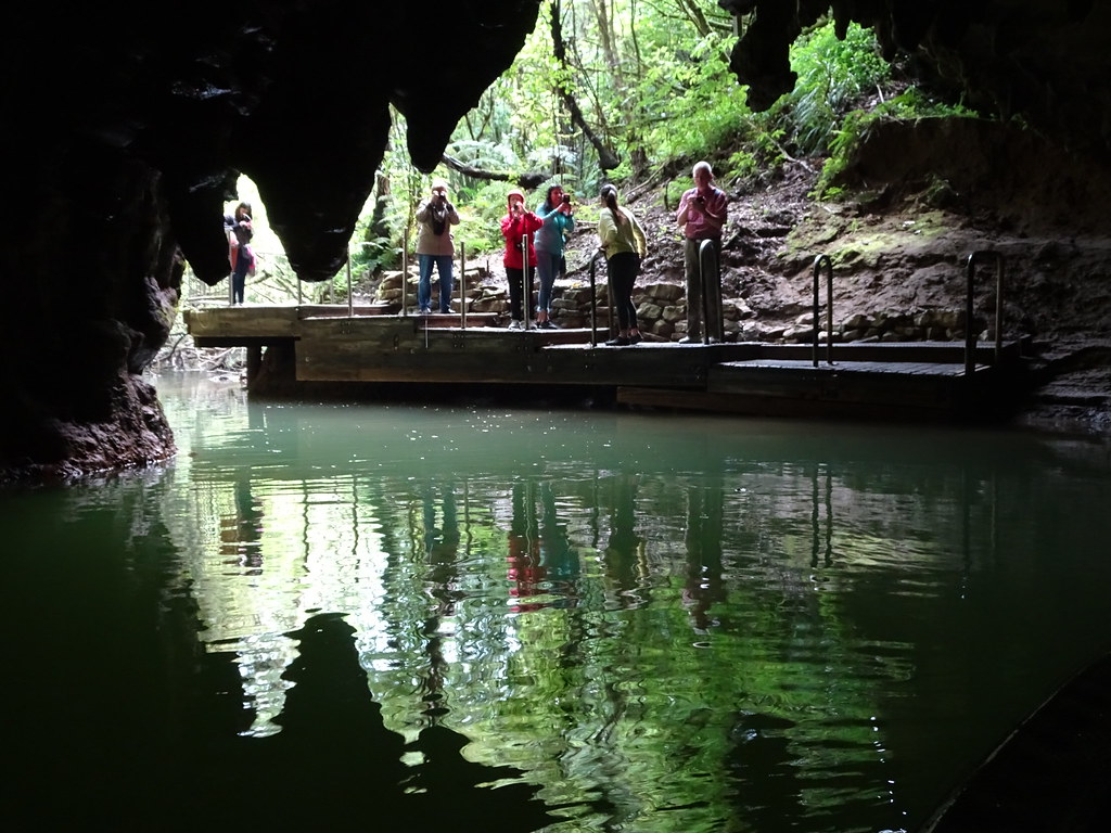 Waitomo. Cave boat trip about to arrive at the exit of the… | Flickr