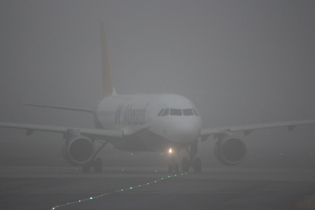 Monarch Airlines G-ZBAP  Airbus A320-100 on a foggy day at Manchester MAN England UK