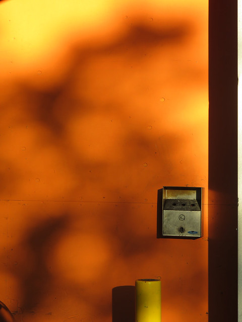 An orange reflection with bokeh abstract in a Granville Island parking garage, Vancouver, Canada